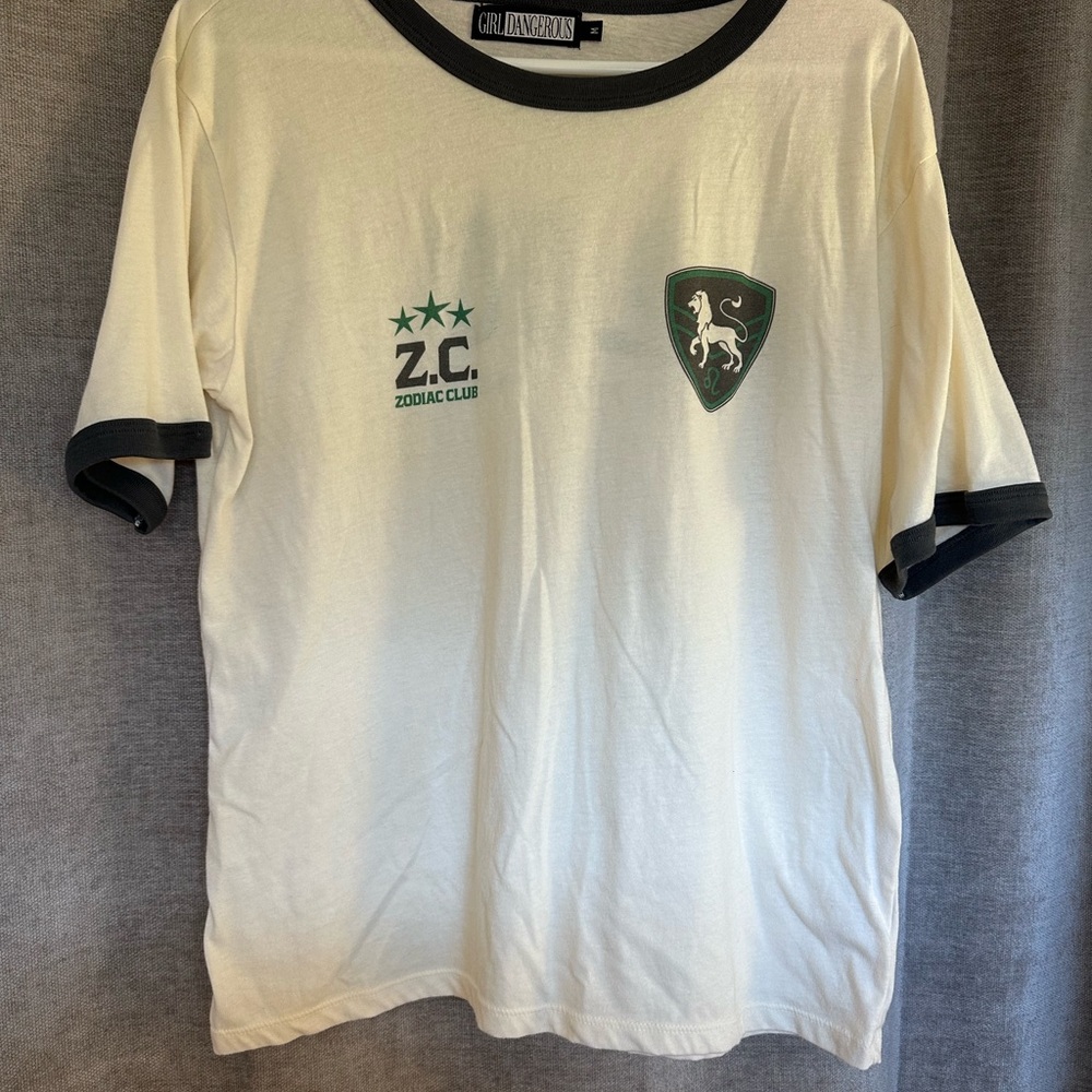 Leo Girl Dangerous Cream T-Shirt and Zodiac Club logo